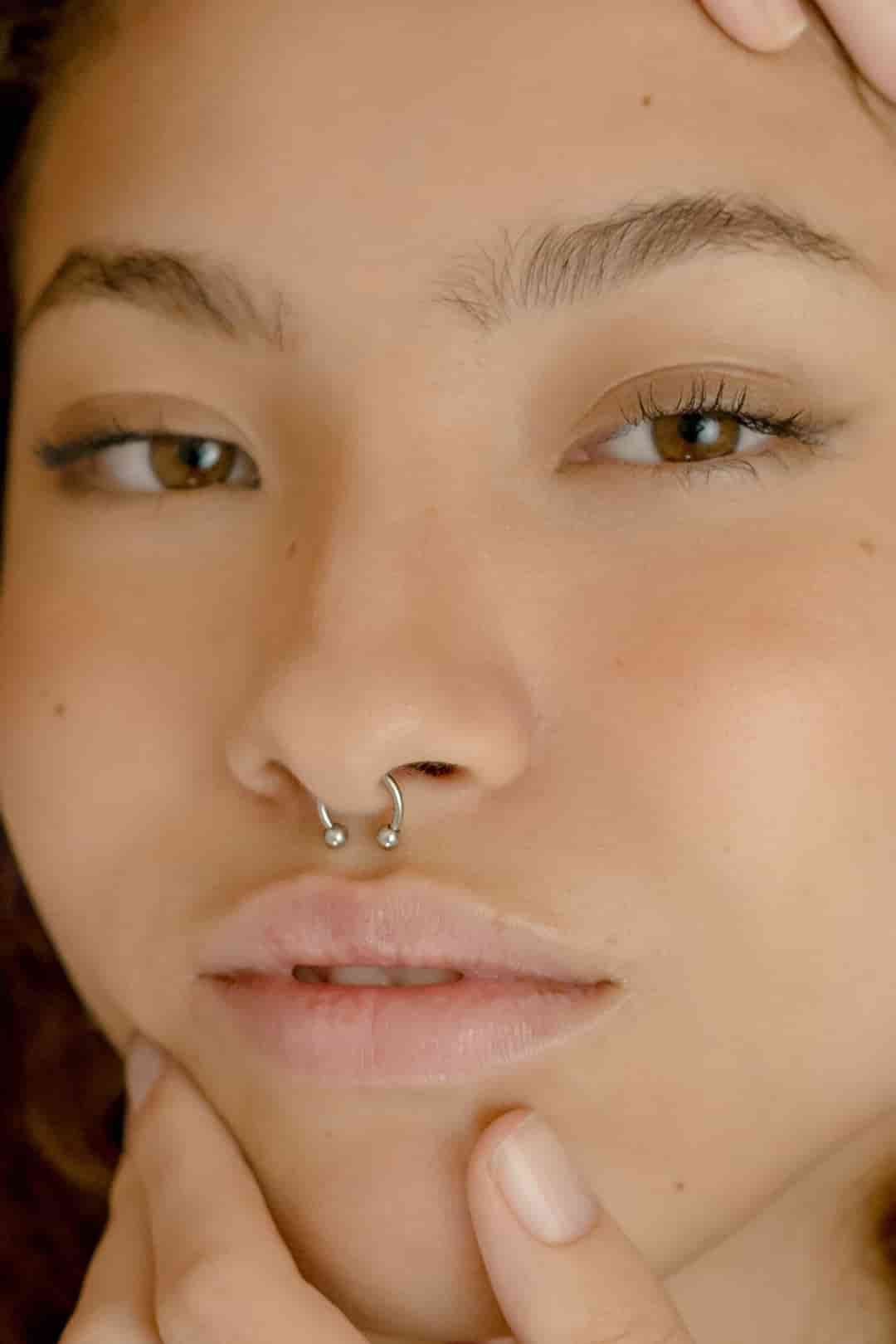 Horse Nose Ring on a Double Septum Piercing