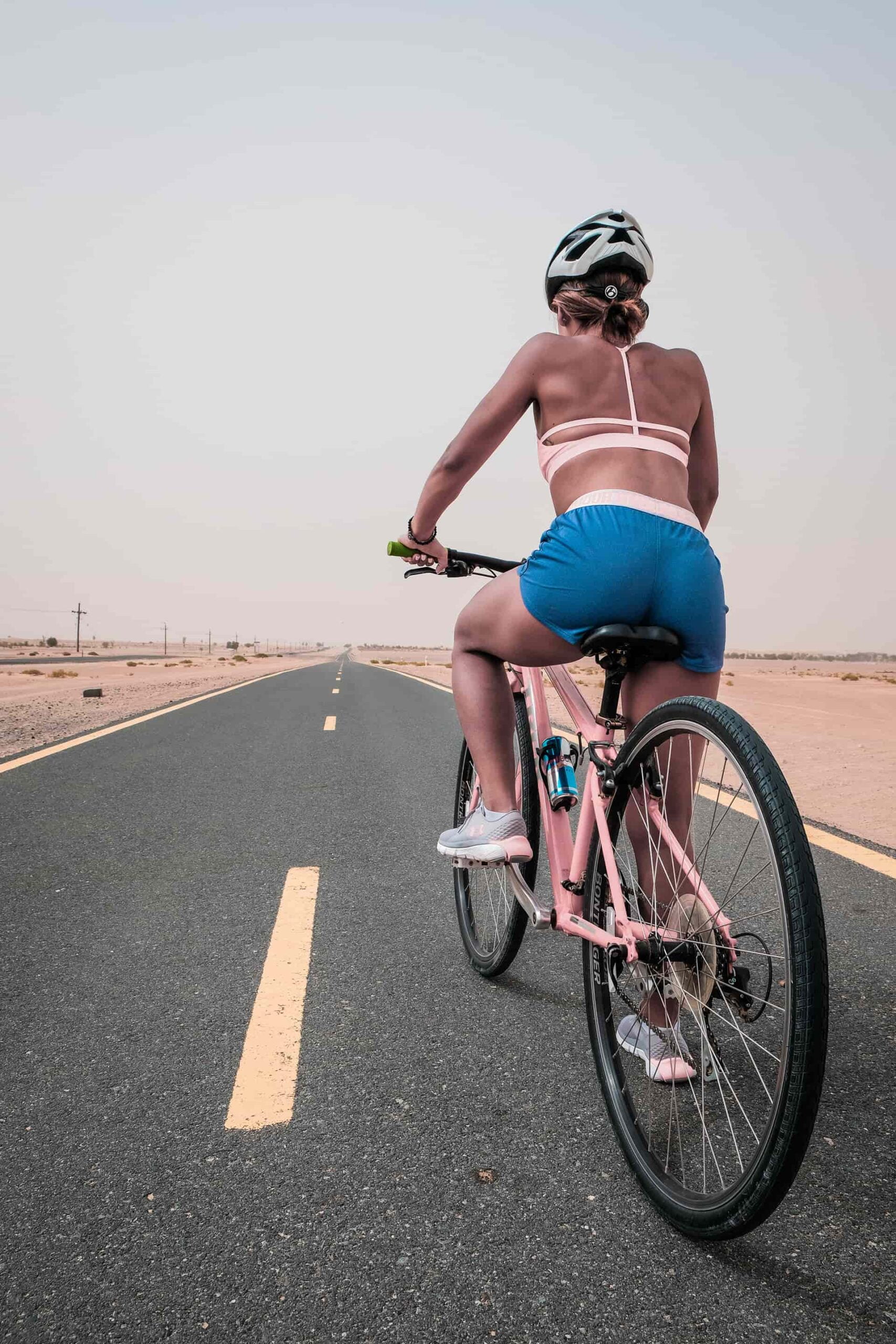 Biking doesn't really make your butt bigger or smaller but it can help tone your buttocks