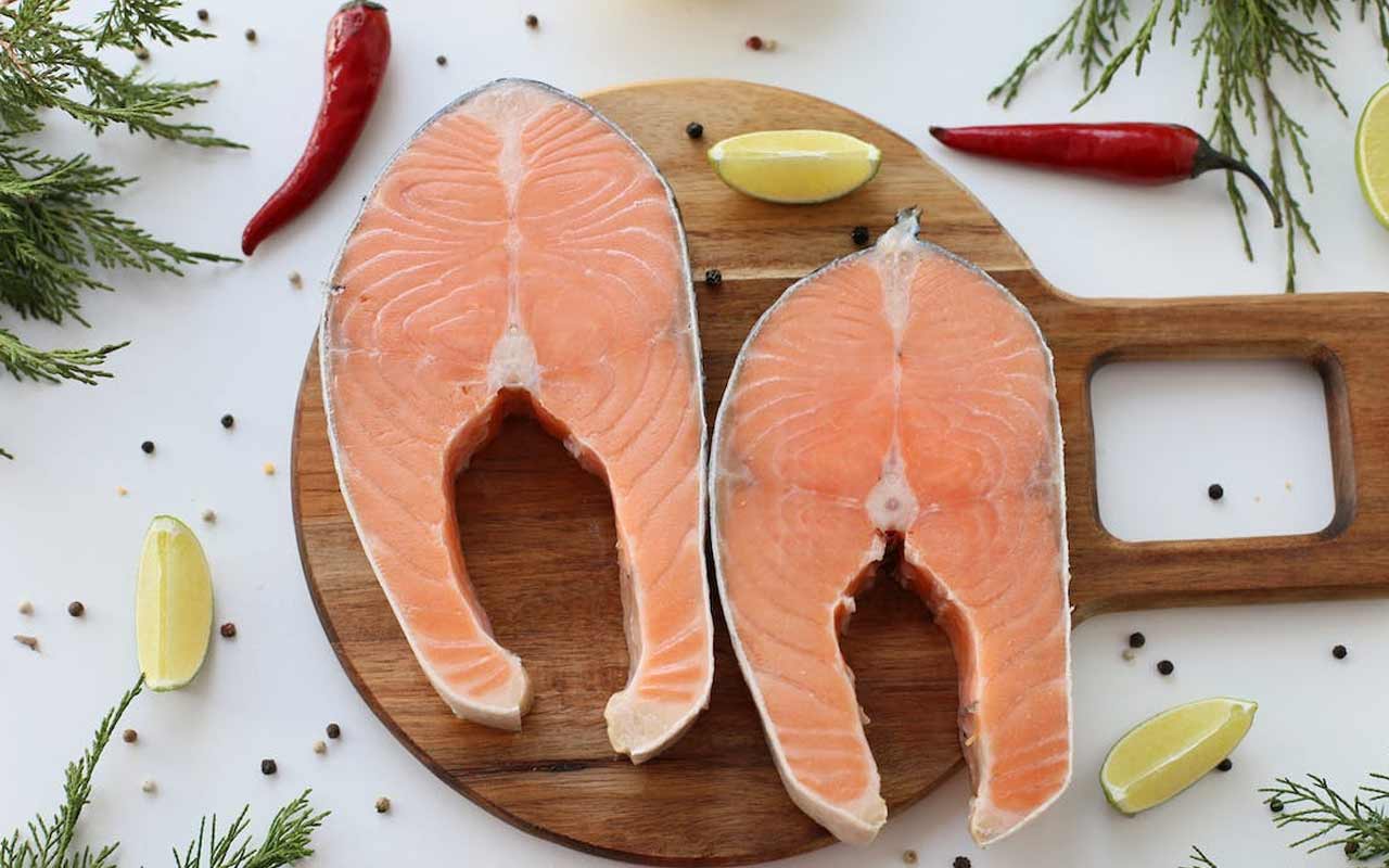 How much salmon to eat per day?