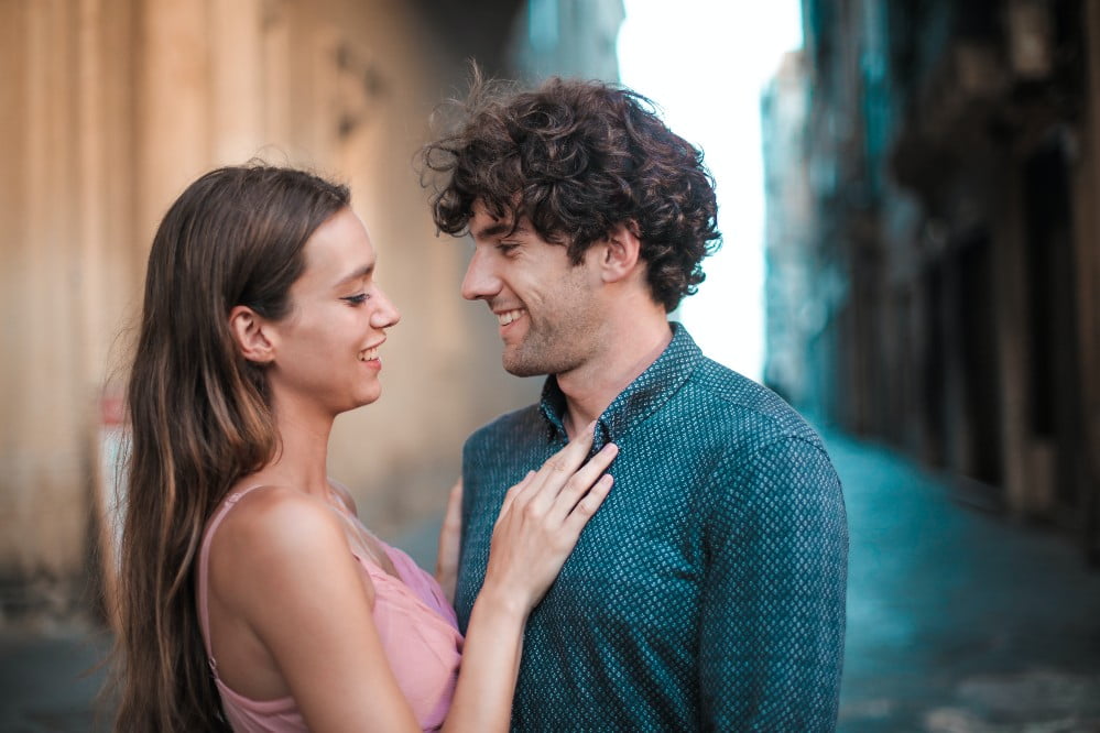 Habits of Highly Intimate Couples 3 A couple making eye contact and smiling at each other