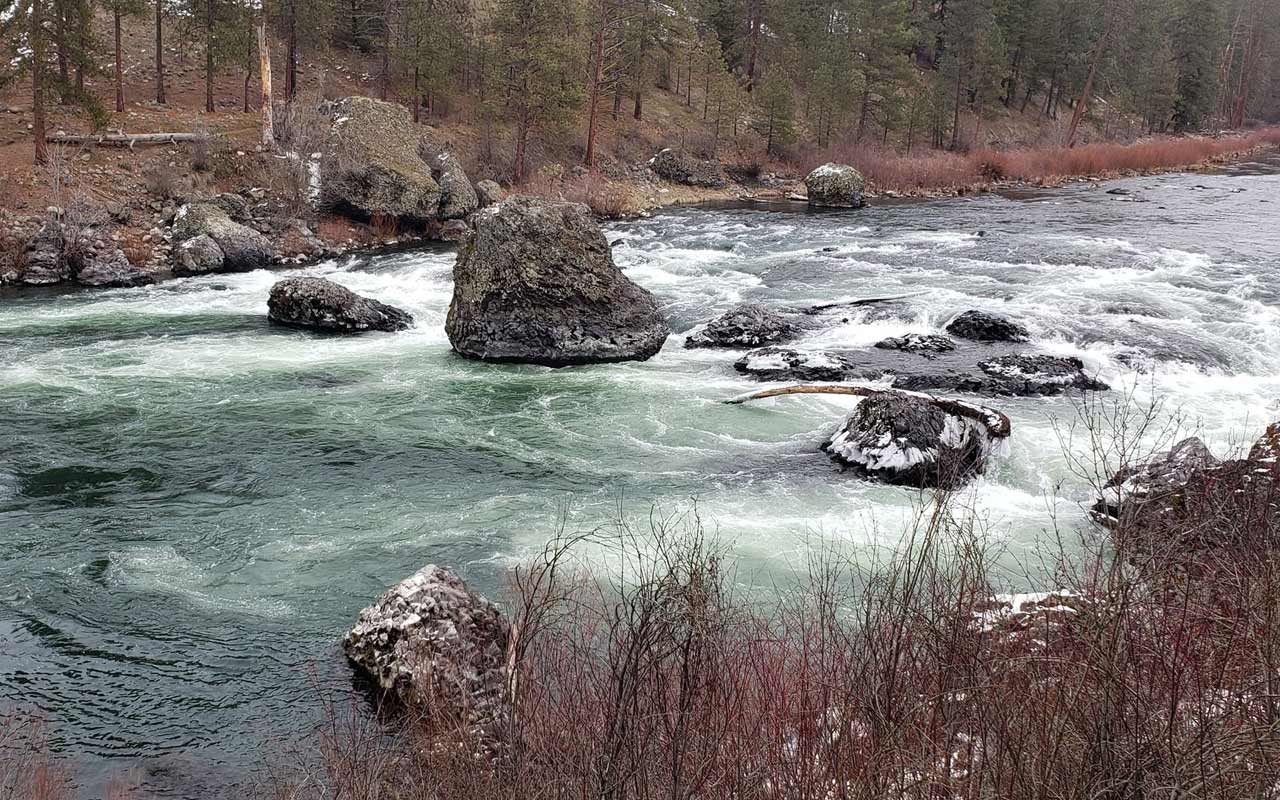 Basalt cliffs towering over the Spokane River in Riverside State Park. Basalt cliffs towering over the Spokane River in Riverside State Park.
