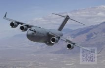 A U.S. Air Force C-17 Globemaster III T-1 flies over Owens Valley, California, for a test sortie