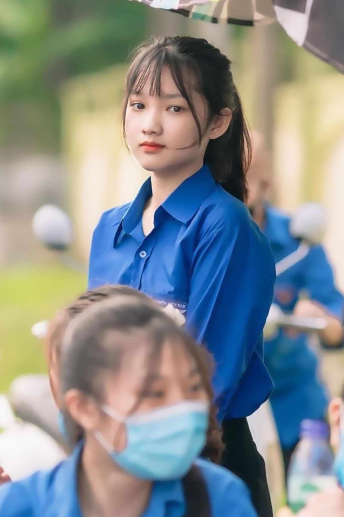 Vietnamese Girl with Voluntary Blue shirt