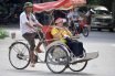 Taking a cyclo in Hanoi, Vietnam
