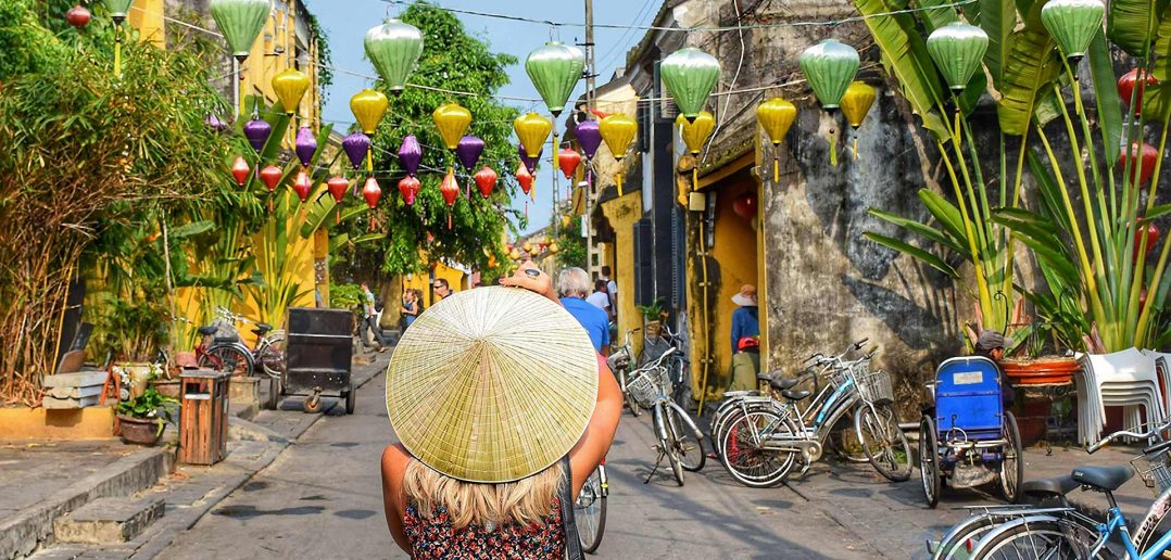 Tourist Wearing Canon Hat In Hoi An