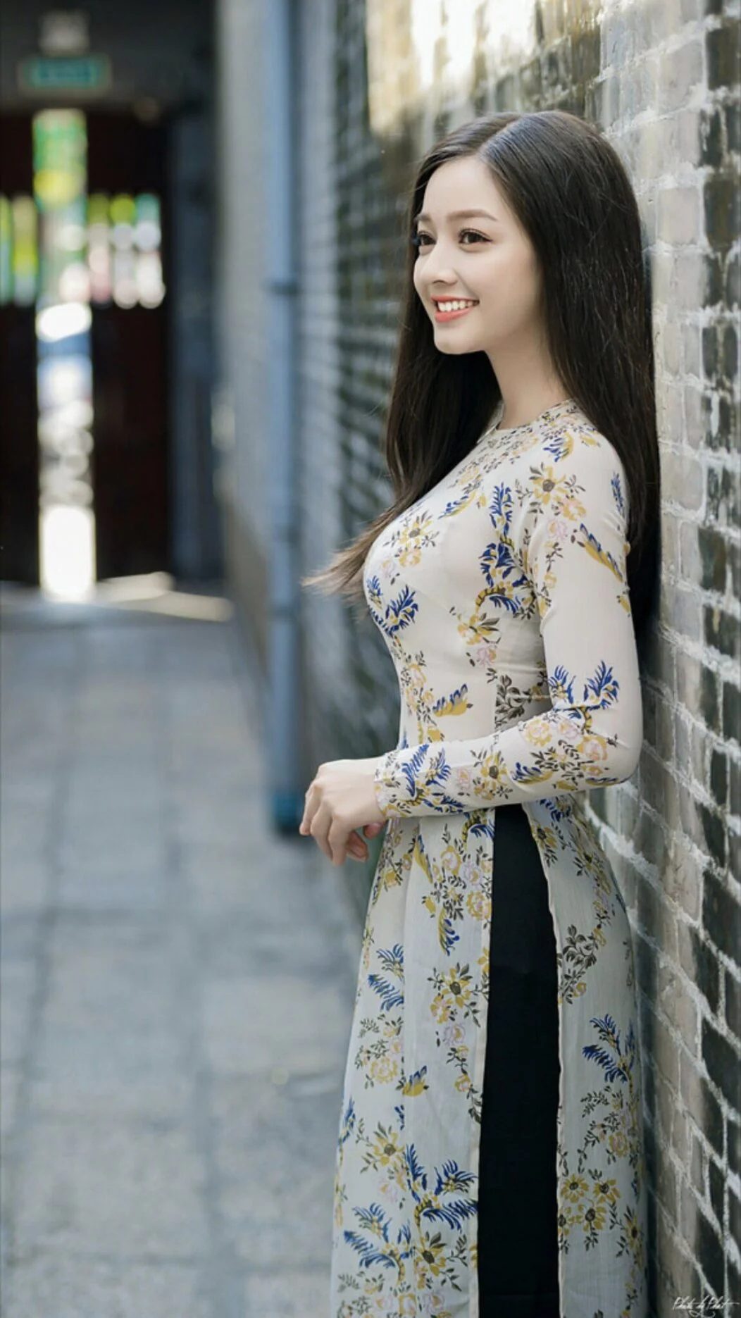 A photo of a Vietnamese woman wearing an Ao Dai A photo of a Vietnamese woman wearing an Ao Dai